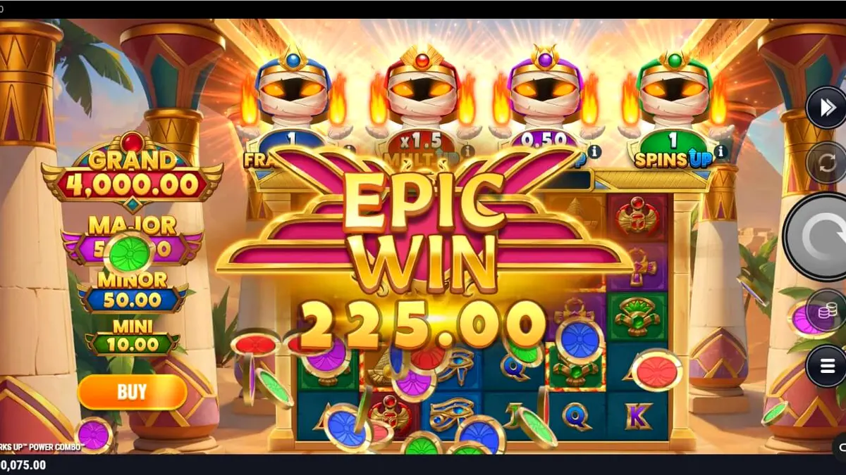 Empat mumi lucu dalam slot Mummy Mania Perks Up Power Combo dengan latar belakang makam Mesir.